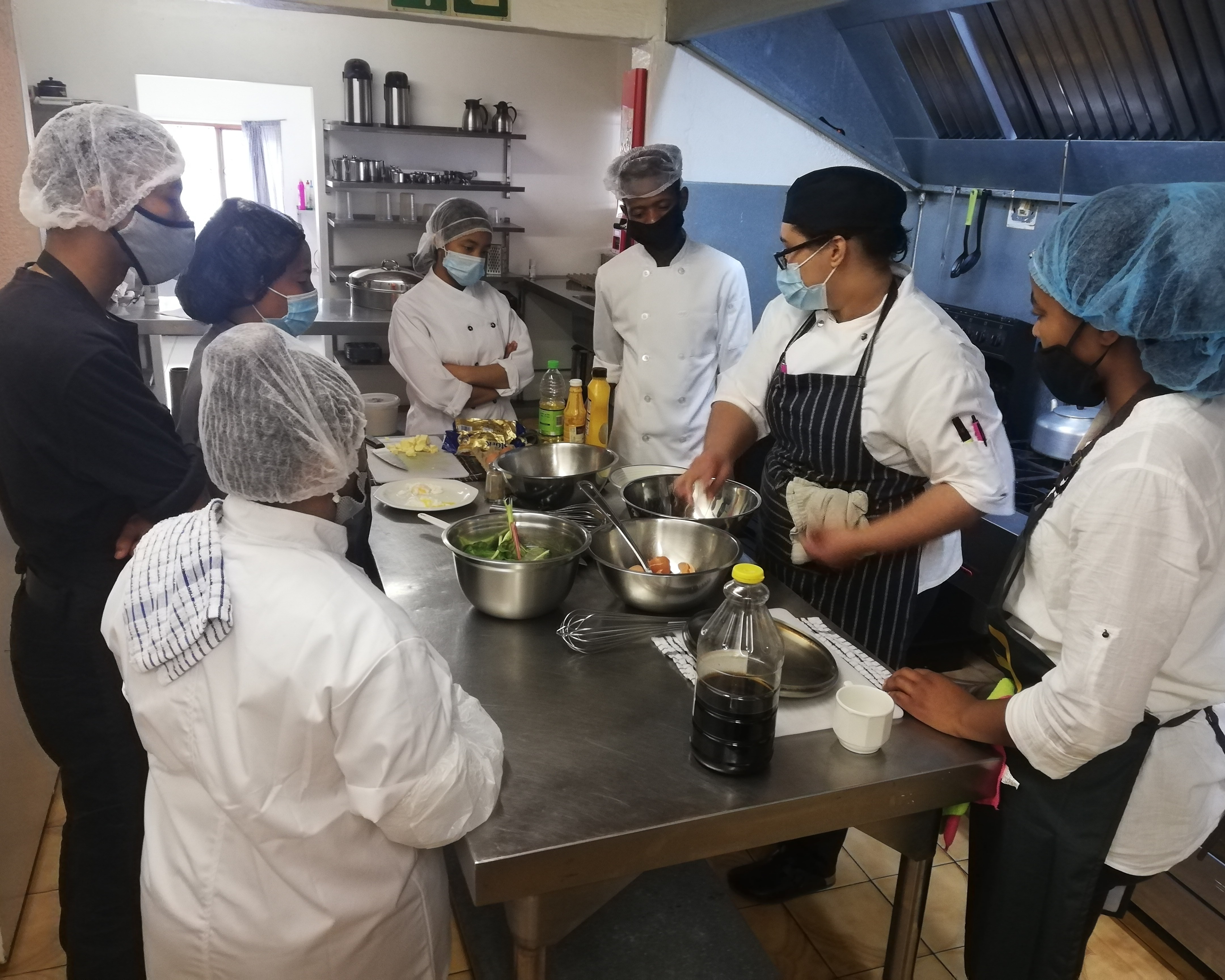 A man giving a speech to the audience